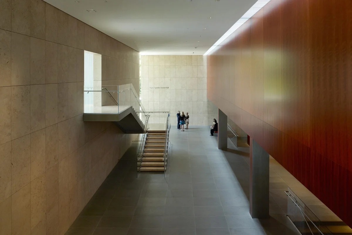 Large public interior clad in stone